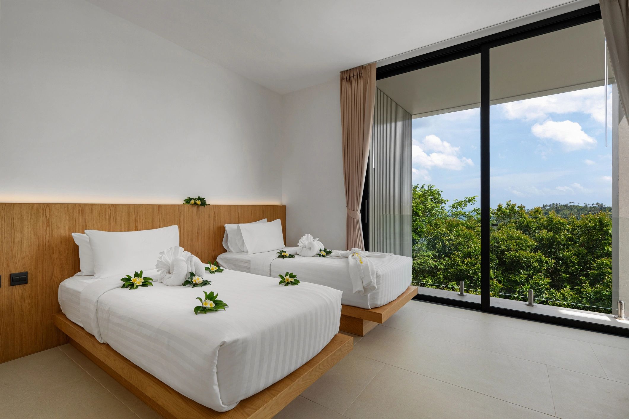Luxury hotel room with panoramic tropical view